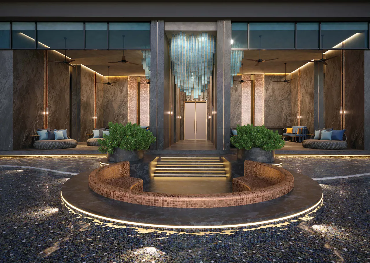The Pool Villa on the Level 11 deck: softly lit seating on both sides and, at the centre, a tiered round water feature beneath a crystal chandelier (CGI)