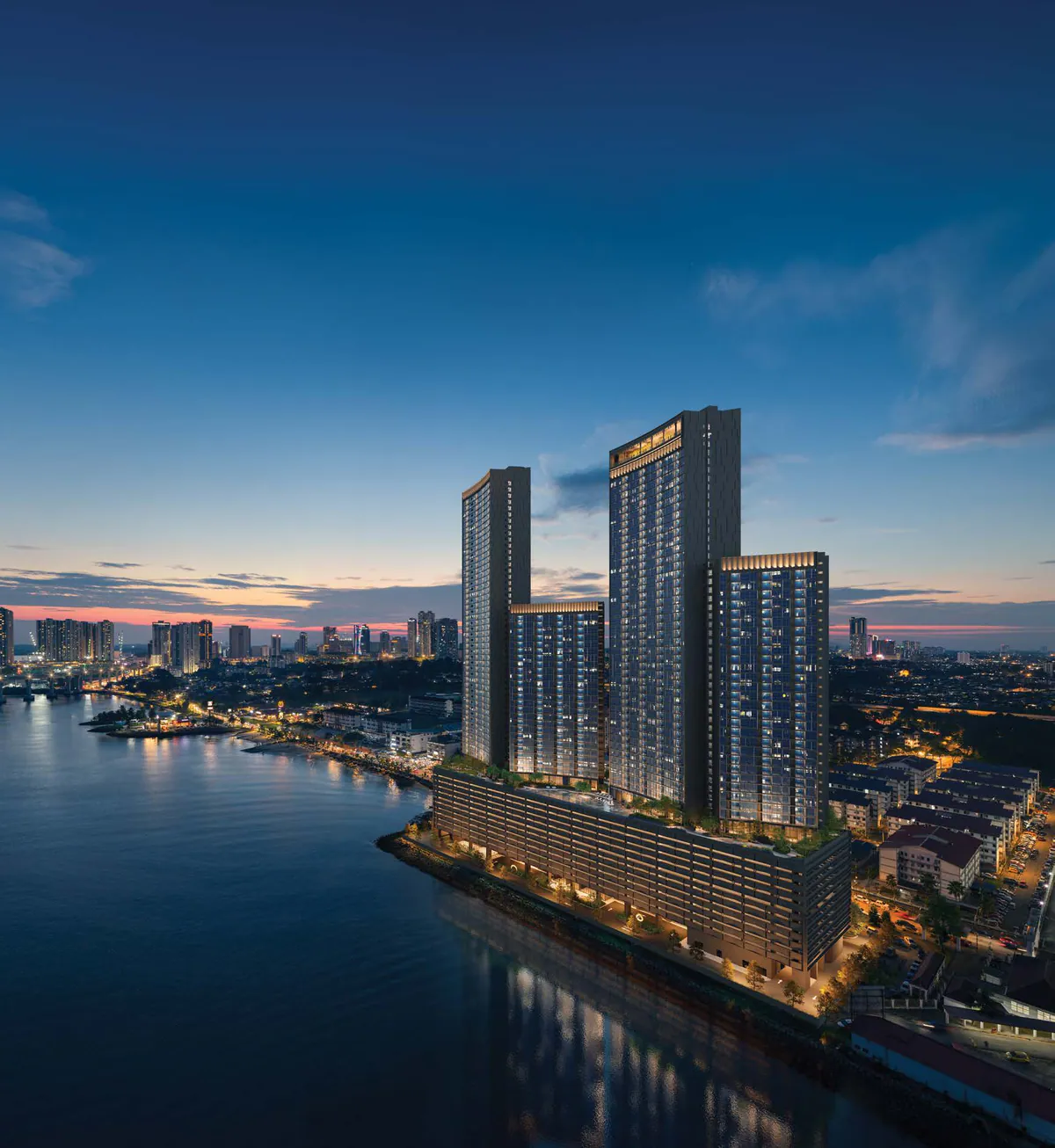 The four crowns of The Eclipse lit at dusk on the Johor shore (photograph with CGI of the proposed towers)